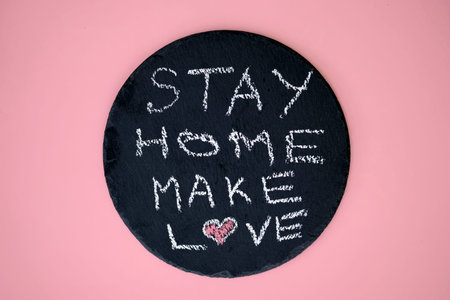The inscription stay home and make love. The concept of positive attitude during a pandemic of the...