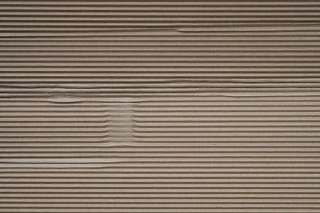 Corrugated paper top view background. Corrugated paper texture for packaging. Brown paper for packaging.の写真素材