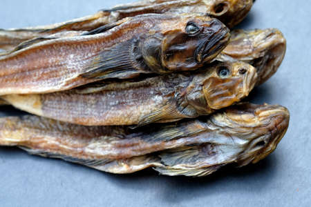 Dried gobies close up. Salted dried fish for beer. Dried salted Gobius top view.の写真素材