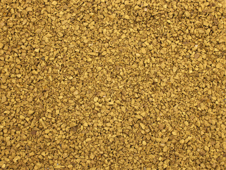 instant coffee beans top view. Heap of instant coffee for background closeup. Dry Brown instant...