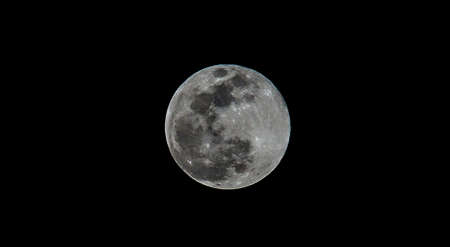 August moon in the night skyの写真素材
