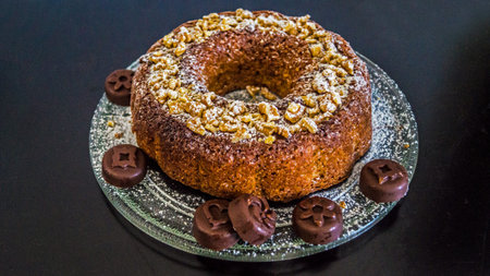 Delicious sponge cake decorated with icing sugar