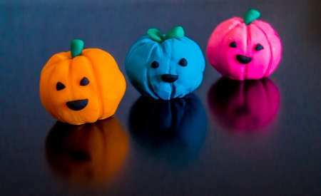 Decorative Halloween pumpkins made of plasticineの写真素材