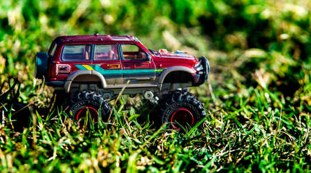 Toy car on the grassの写真素材