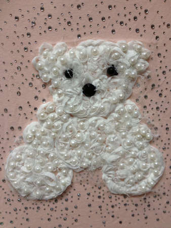 White teddy bear with pearlsの素材