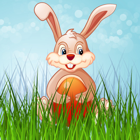 Happy Easter bunny and eggs in the grass.のイラスト素材