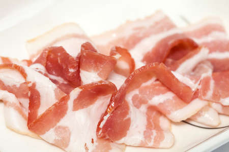 Raw pork bacon slicesの写真素材