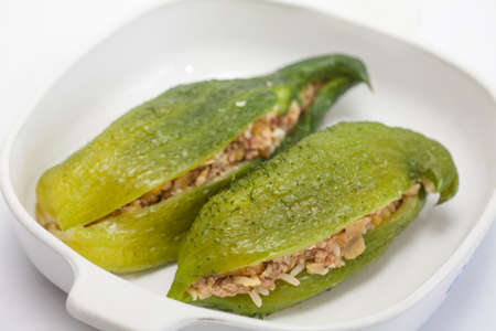 Filled stuffing cucumbers in a baking dishの写真素材