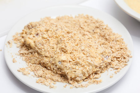 Breading a cordon bleu - adding crumbled cracker