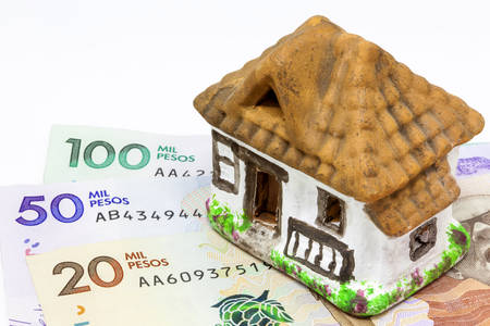 Saving money (pesos) to buy the house of my dreamsの写真素材