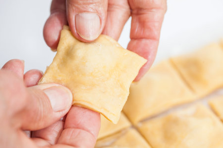 Ravioli Preparation : Raw cut ravioliの写真素材