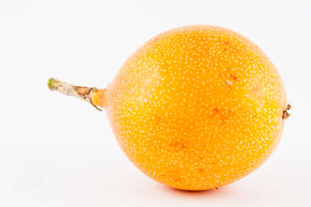 Sweet granadilla (Passiflora ligularis) isolated in white backgroundの写真素材