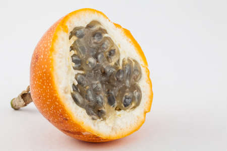 Sweet granadilla (Passiflora ligularis) isolated in white backgroundの写真素材
