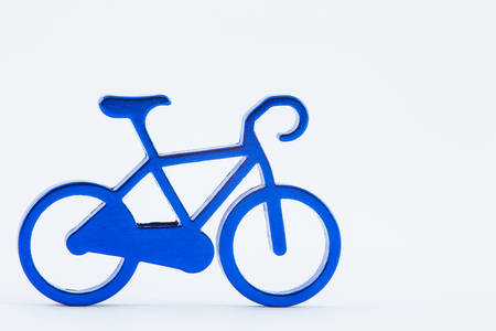 Blue toy bicycle isolated on white backgroundの写真素材