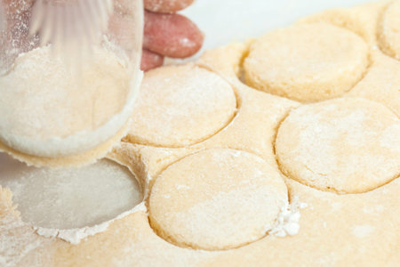 Butter Cookies Preparation : Round cut of cookie's doughの写真素材