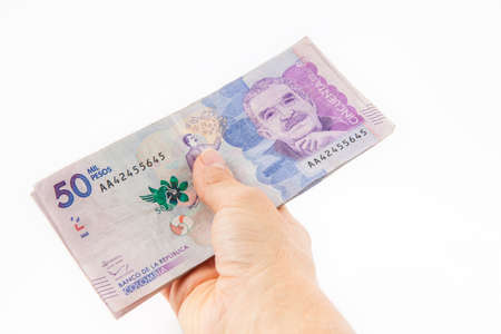 Close up of a woman handling moneyの写真素材