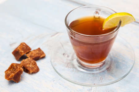 Hot sugarcane-water (aguapanela) with lemonの写真素材