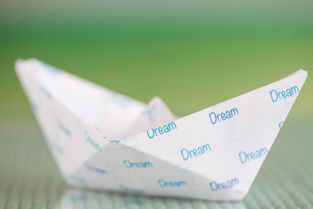 Origami boat: follow your dreams conceptの写真素材