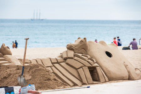 Sand sculpture at La Barceloneta Beach in Barcelona Spainのeditorial素材