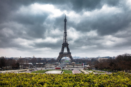 The famous Tour Eiffel at the end of winter under storm cloudsのeditorial素材