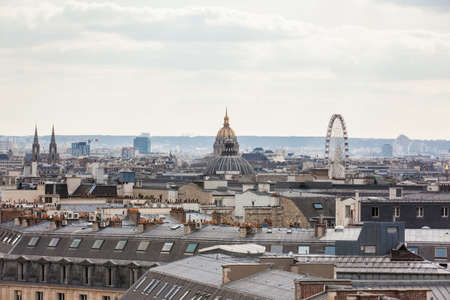 The beautiful Paris City seen from a rooftop in a cold winter dayの写真素材