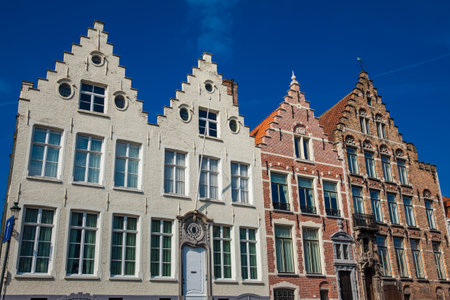 BRUGES, BELGIUM - MARCH, 2018: Houses representative of the traditional arquitecture of the historical Bruges townのeditorial素材