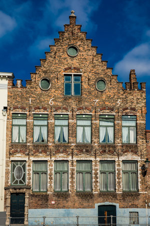 BRUGES, BELGIUM - MARCH, 2018: Houses representative of the traditional arquitecture of the historical Bruges townのeditorial素材