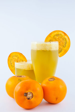 Lulo juice a traditional Colombian exotic fruit (Solanum quitoense)の写真素材