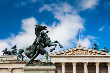 The historical Austrian Parliament Building completed in 1883 and located on the Ringstrabe boulevard in the first district of Viennaのeditorial素材