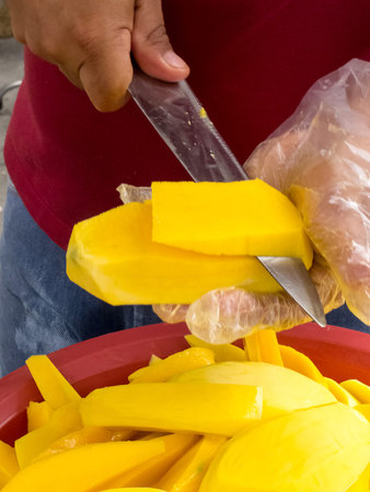 Street sell of fresh topical mango at Cali city center