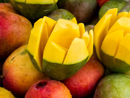 Street sell of fresh topical mango at Cali city centerの写真素材