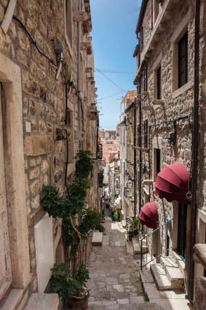 The beautiful steep alleys at the walled old town of Dubrovnikの写真素材