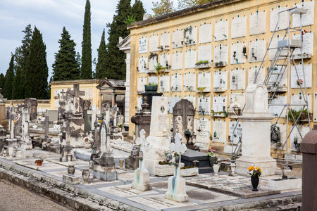 The beautiful art of the grave on the Cemetery of the Holy Door to a monumental cemetery located within the fortified bastion of the Basilica of San Miniato al Monte in Florenceのeditorial素材