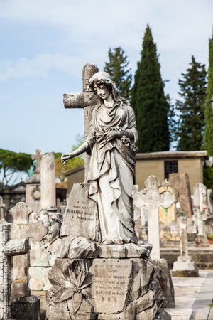 The beautiful art of the grave on the Cemetery of the Holy Door to a monumental cemetery located within the fortified bastion of the Basilica of San Miniato al Monte in Florenceのeditorial素材