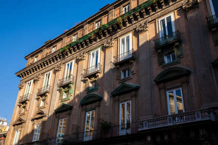 Beautiful facades of the antique buildings in Naples old cityの写真素材