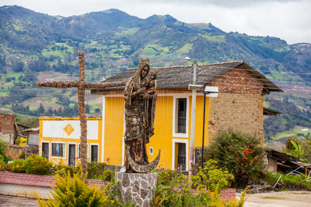 Statue of the Virgin Mary and Jesus in front of the Chapel Our Lady of the Rosary an ancient church of Turmeque city in Colombiaのeditorial素材