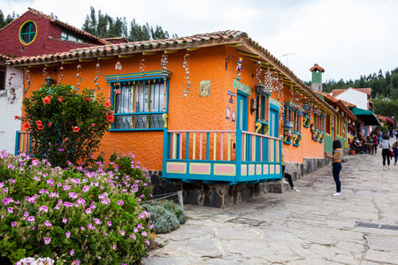 Tourists visiting the beautiful touristic place called Pueblito Boyacense located in Duitamaのeditorial素材