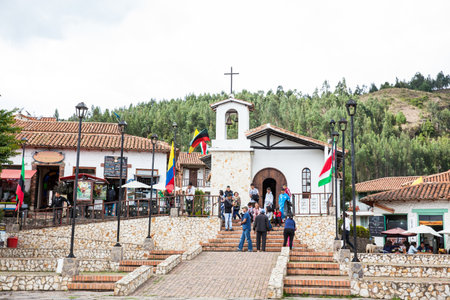 Tourists visiting the beautiful touristic place called Pueblito Boyacense located in Duitamaのeditorial素材