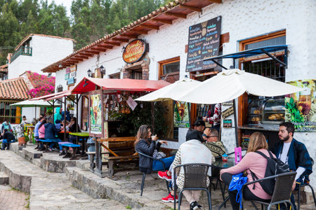 Tourists visiting the beautiful touristic place called Pueblito Boyacense located in Duitamaのeditorial素材
