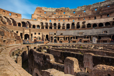 View of the seating areas and the hypogeum of the ancient Colosseum in Rome