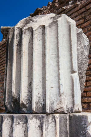 Remains of columns of the ancient buildings at the Roman Forum in Romeの写真素材