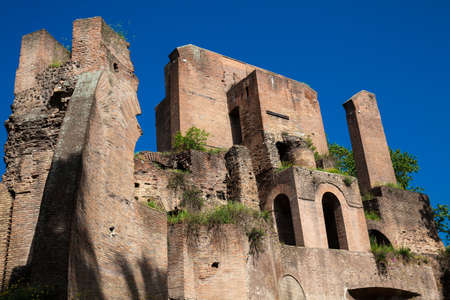 Ruins of an antique monumental fountain called Trofei di Mario built in 226 AD and  located at Piazza Vittorio Emanuele II in Romeの写真素材
