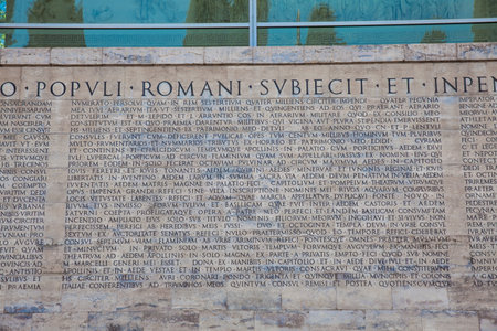 ROME, ITALY - APRIL, 2018: Detail of the fascist-era copy of the Res Gestae Divi Augusti at the Museum of the Ara Pacisのeditorial素材