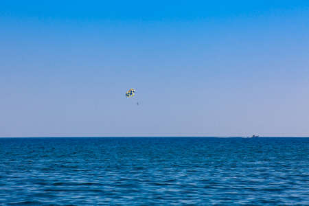 Parasailing in Perissa village beach at Santorini Islandの写真素材