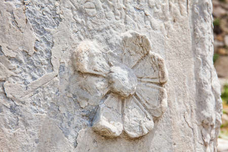 Detail of the carvings at the ancient ruins on the Roman Agora located to the north of the Acropolis in Athensの写真素材