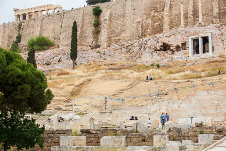 ATHENS, GREECE - APRIL, 2018: Ancient ruins on the south face of the Acropolis Hill in Athens cityのeditorial素材