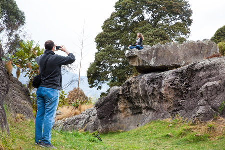 FACATATIVA, COLOMBIA - JANUARY, 2029: Tourists visiting the Piedras del Tunjo Archaeological Park in the municipality of Facatativaのeditorial素材