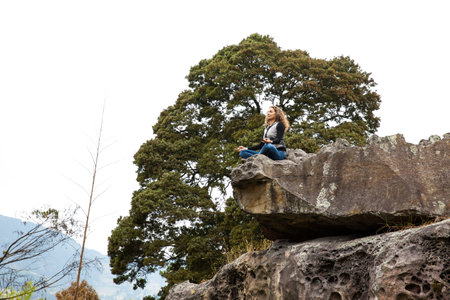 FACATATIVA, COLOMBIA - JANUARY, 2029: Tourists visiting the Piedras del Tunjo Archaeological Park in the municipality of Facatativaのeditorial素材