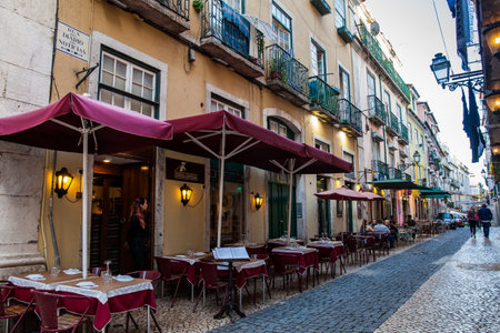LISBON, PORTUGAL - MAY, 2018: View of the restaurants at the Rua do Diario de Noticias in Lisboaのeditorial素材