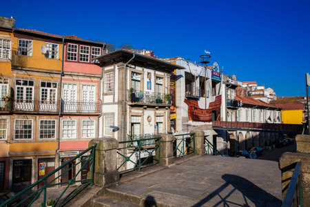 PORTO, PORTUGAL - MAY, 2018: World of Discoveries museum and facades of the antique houses at...
